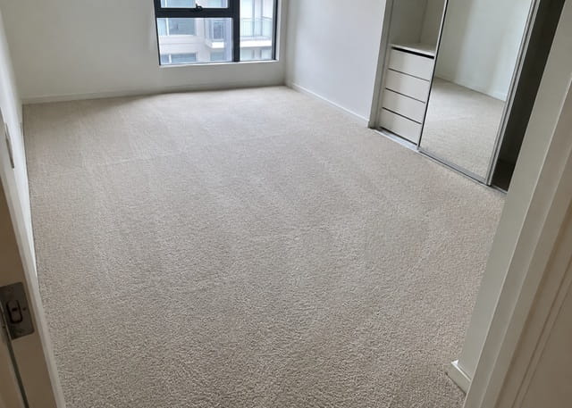Same bedroom carpet after professional steam cleaning in Sydney – stains removed